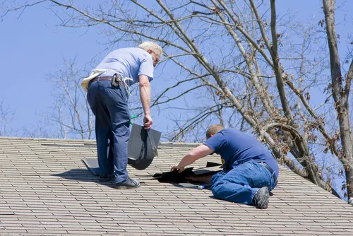 Storm-damaged roof documented for an insurance claim - Exteriors Plus