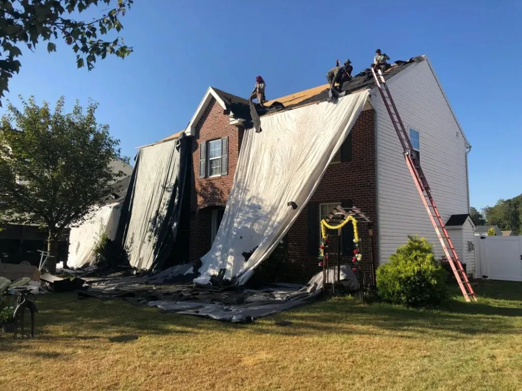 Professional emergency & storm damage project completed in the Twin Cities - Exteriors Plus Roofing